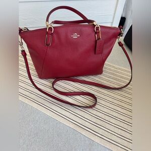 Coach Red Leather Handbag With Gold Tone Hardware And Removable Shoulder Strap.